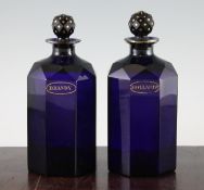 A pair of George III Bristol blue glass decanters, c.1800, of octagonal form with multi-facetted