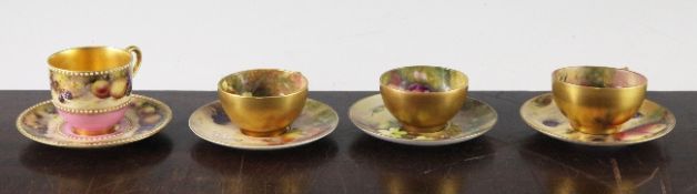 Four Royal Worcester fruit or flower painted cabinet cups and saucers, the first painted by