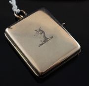 A late Victorian 9ct gold rectangular locket, with engraved armorial, John Milward Banks, London,