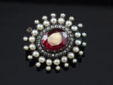 An early 19th century gold and silver, foil backed synthetic? ruby, rose cut diamond and seed pearl