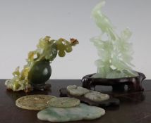 A group of Chinese hardstone and jade carvings, 20th century, to include a green jade plaque of a