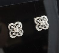 A pair of Art Deco style 18ct white gold and diamond cluster ear studs, of quatrefoil design.