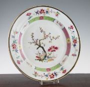 A Chinese famille rose dish, Qianlong period, painted to the centre with prunus, peony and fungus,