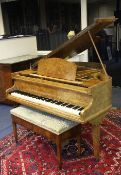 A 1930`s Monnington & Western burr walnut cased baby grand piano, no.53433, on square tapering legs