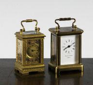 An Edwardian gilt brass miniature carriage timepiece, decorated with gilt panels of birds, 2.5in.,