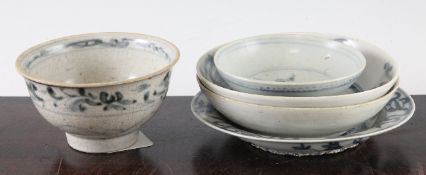 Four Chinese Ming blue and white dishes and an Annamese blue and white bowl, including a pair of