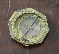 A brass Augsberg equinoctical compass sundial, of octagonal shape with engraved decoration, the