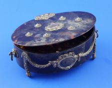 A late Victorian silver mounted tortoiseshell oval two handled trinket box, the hinged lid with