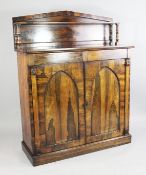 A William IV rosewood chiffonier, the raised back with single shelf and turned supports above two