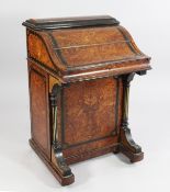 A Victorian burr walnut and ebony davenport, with pop up stationery compartment, sliding writing