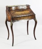 A 19th century French bombe shape and marquetry inlaid bureau de dame, with pierced three quarter
