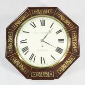 Joseph Thwaites, London. A Regency brass inlaid mahogany octagonal dialled wall timepiece, with