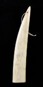 A scrimshaw walrus tusk, decorated with a lady in Victorian costume, 2in.