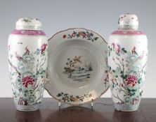 Two Chinese famille rose jars and covers, a similar soup plate, 18th / 19th century, the pair of