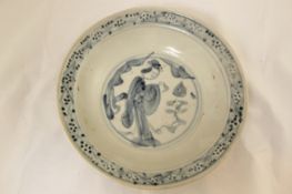 Two Chinese Ming blue and white dishes and a similar shard, 16th century, the first painted to the