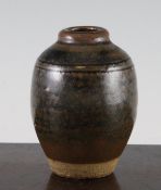 A Bernard Leach St Ives pottery vase, of ovoid form, decorated in a mottled brown glaze and black