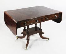 A 19th century mahogany and rosewood banded sofa table, with two drawers opposing two dummy