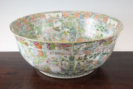 A large Chinese famille rose punch bowl, mid 19th century, the interior and exterior painted with