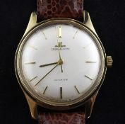 A gentleman`s 1960`s 9ct gold Jaeger le Coultre automatic wrist watch, with baton numerals and