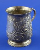A George III silver christening mug with later embossed decoration, and engraved monogram, Duncan