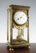 A 19th century French ormolu four glass mantel clock, with enamelled arabic dial and bi-metallic