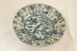 Two Chinese Ming blue and white dishes, Swatow 17th century, the central foliate medallion