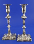 A pair of George V 18th century style silver candlesticks, with knopped stems, George Edward & Sons