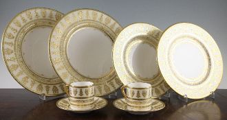 A Minton Trophies H5329 pattern dinner and coffee service, comprising thirteen breakfast plates,