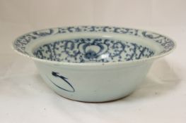 A Chinese blue and white wash bowl and a Chinese late Ming blue and white dish, the Daoguang period