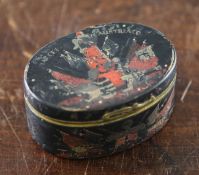 A 19th century Continental black lacquer painted and gold inlaid oval snuff box, decorated with