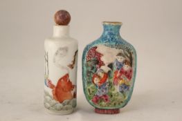 Two Chinese famille rose snuff bottles, 1821-50, the first painted with a leaping carp beneath a