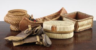 A collection of Native American items, including an oval quill work box, a similar square box, a