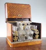 A late 19th century French kingwood parquetry inlaid and brass mounted liqueur set, the lid and