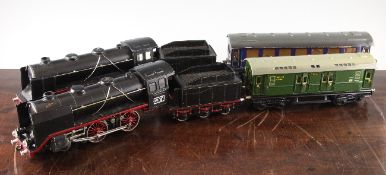 A collection of Marklin O-gauge trains and accessories, c.1938-40, to include a locomotive and