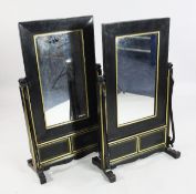 A pair of Chinese parcel gilt and black lacquer mirrors, modelled as table screens, with
