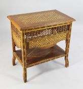 A late 19th / early 20th century Syrian inlaid side table, with mashrabiya panels and fold down