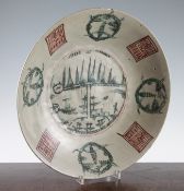 A Chinese Ming wucai dish, Swatow 16th / 17th century, painted with the split pagoda design,