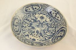 Two Chinese Ming blue and white dishes, Swatow 17th century, the centre medallion with a pair of