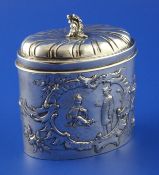 A late 19th/early 20th century German 800 standard silver tea caddy, of oval form, with wrythened
