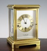 A Rapport of London gilt brass chiming mantel clock, with Roman dial and movement striking on