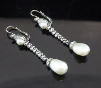 A pair of white gold, natural pearl and diamond set drop earrings, with Gem & Pearl Laboratory