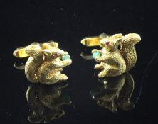 A pair of 18ct gold gem set novelty cufflinks modelled as squirrels, each with cabochon ruby eyes