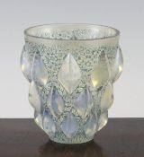 A Lalique Rampillon opalescent glass vase, with blue staining, etched mark `R LALIQUE FRANCE`, 5in.