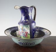 A Chinese Canton enamel ewer and basin, Daoguang period, c.1830, each painted with reserves of