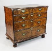An 18th century walnut chest on stand, now converted to two pieces of furniture, the chest section