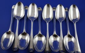 A set of ten George III silver hanovarian pattern table spoons, with engraved monogram, Thomas