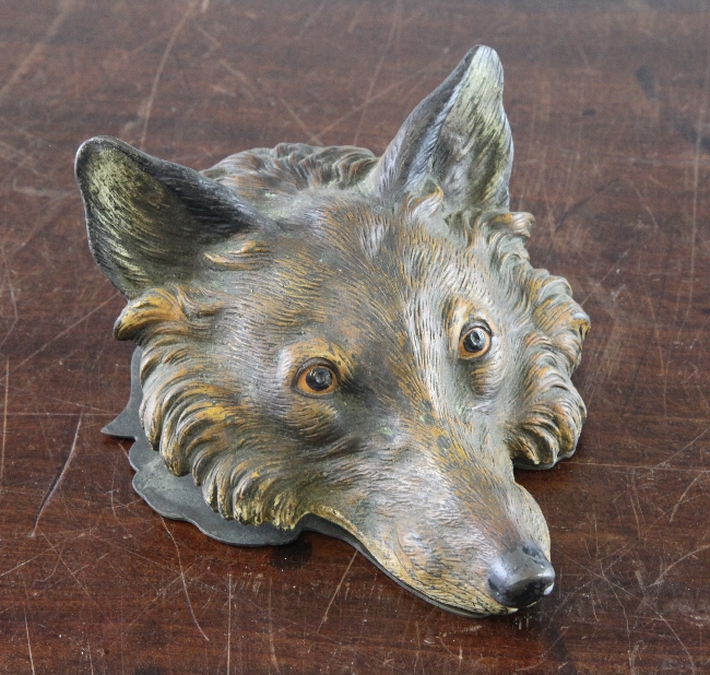 A late 19th / early 20th century cold painted bronze letter clip, modelled as a fox`s head,