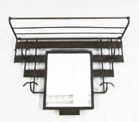 A French Art Deco wrought iron wall mounted coat rack, with central mirror, 27in.