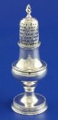A George III silver caster by Hester Bateman, of baluster form with drilled grill and wrythen