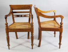 A set of six 20th century teak Raffles elbow chairs, with cane seats and reeded arms and legs